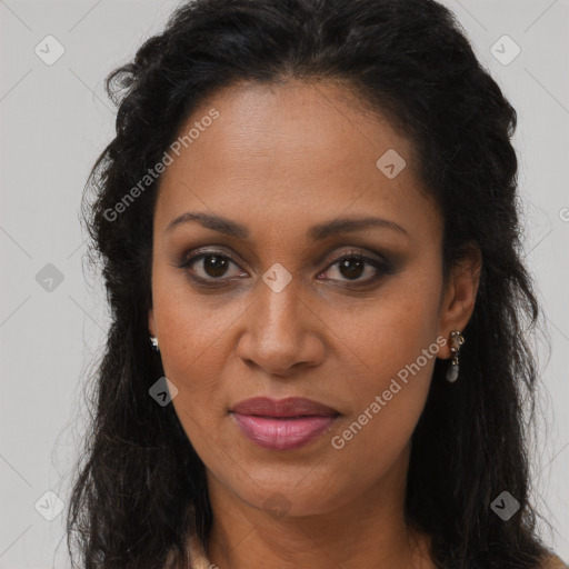 Joyful black young-adult female with long  brown hair and brown eyes