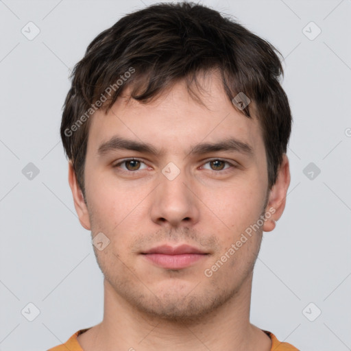 Neutral white young-adult male with short  brown hair and brown eyes