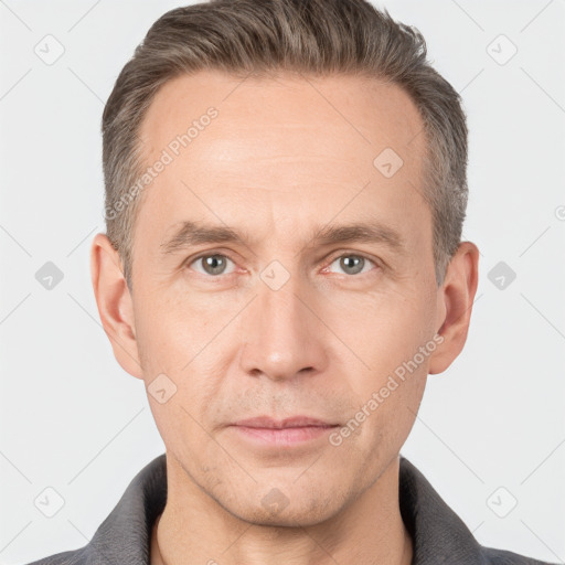 Neutral white adult male with short  brown hair and brown eyes