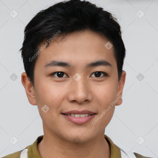 Joyful asian young-adult male with short  brown hair and brown eyes