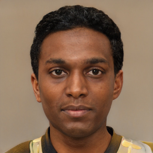 Neutral black young-adult male with short  black hair and brown eyes