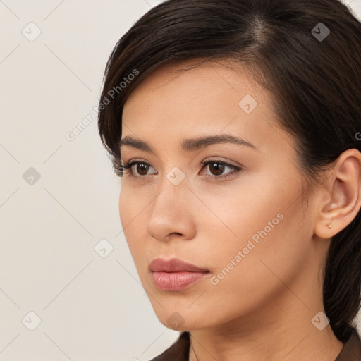 Neutral white young-adult female with medium  brown hair and brown eyes