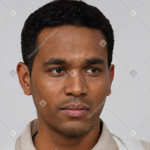 Neutral latino young-adult male with short  black hair and brown eyes