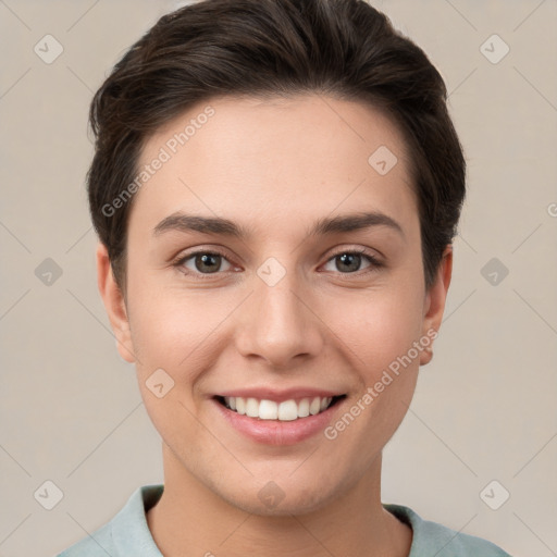 Joyful white young-adult female with short  brown hair and brown eyes