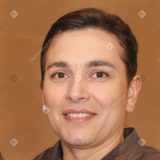 Joyful white adult male with short  brown hair and brown eyes