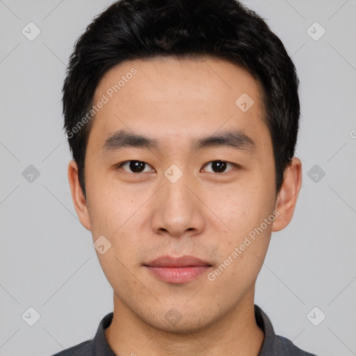 Neutral asian young-adult male with short  black hair and brown eyes