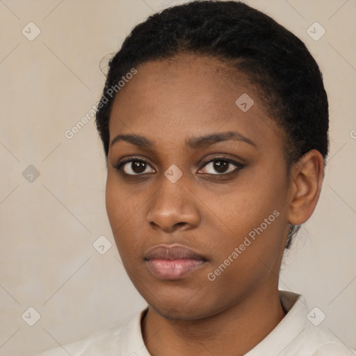 Neutral black young-adult female with short  black hair and brown eyes