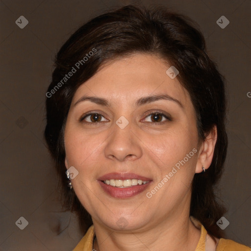 Joyful white adult female with medium  brown hair and brown eyes