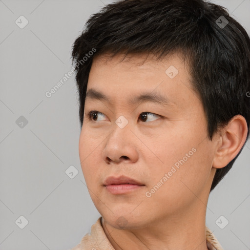 Neutral white young-adult male with short  black hair and brown eyes