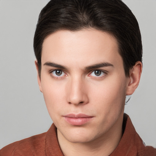 Neutral white young-adult male with short  brown hair and brown eyes