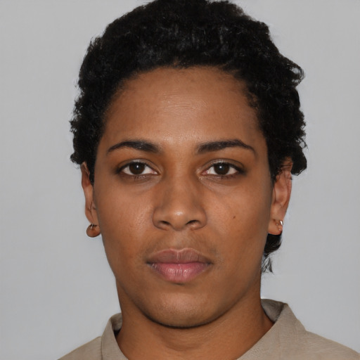 Neutral black young-adult female with short  black hair and brown eyes