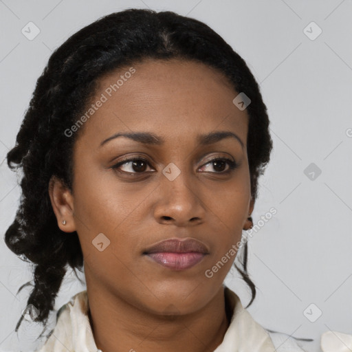 Neutral black young-adult female with medium  brown hair and brown eyes