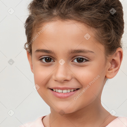 Joyful white child female with short  brown hair and brown eyes