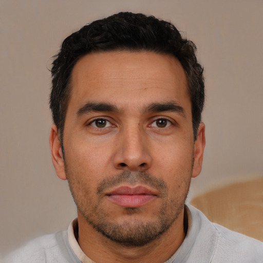 Neutral white young-adult male with short  black hair and brown eyes