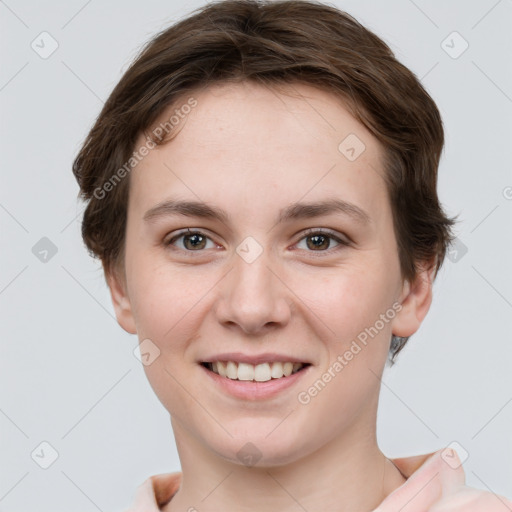 Joyful white young-adult female with short  brown hair and grey eyes