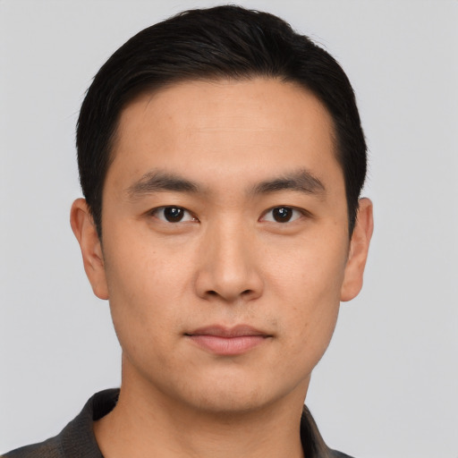 Neutral asian young-adult male with short  brown hair and brown eyes