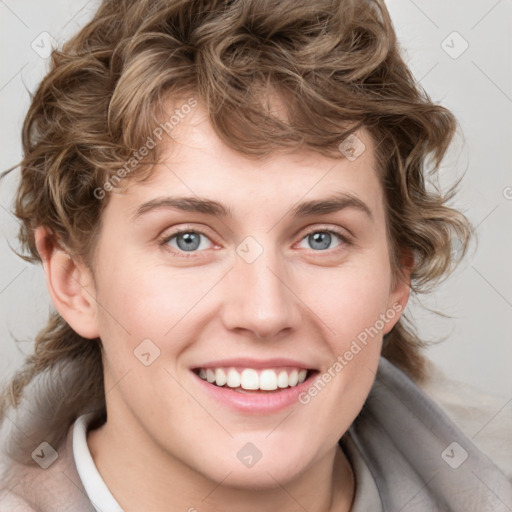 Joyful white young-adult female with medium  brown hair and blue eyes