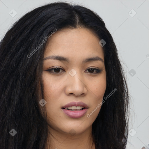 Joyful asian young-adult female with long  brown hair and brown eyes