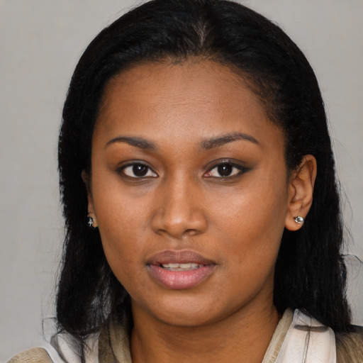 Neutral black young-adult female with medium  black hair and brown eyes
