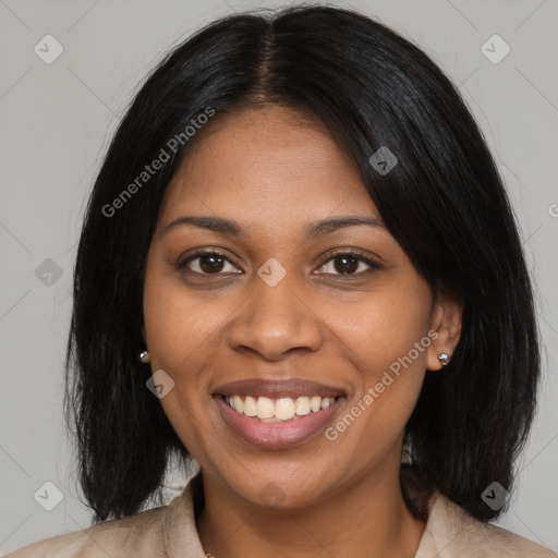 Joyful black young-adult female with long  brown hair and brown eyes