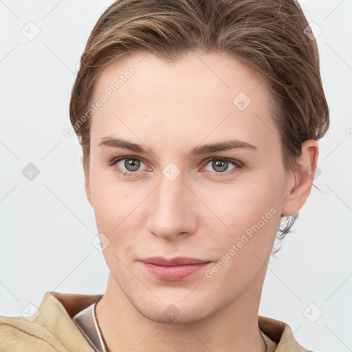 Joyful white young-adult female with short  brown hair and grey eyes