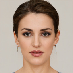 Neutral white young-adult female with short  brown hair and brown eyes