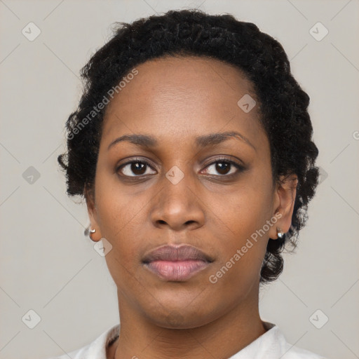 Neutral black young-adult female with short  black hair and brown eyes