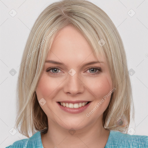 Joyful white young-adult female with medium  brown hair and blue eyes