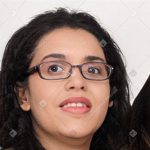 Joyful latino young-adult female with long  brown hair and brown eyes