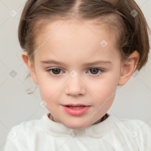 Joyful white child female with short  brown hair and brown eyes