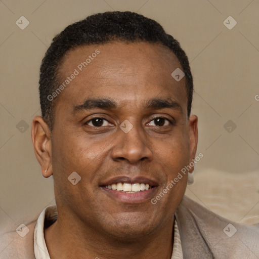 Joyful latino adult male with short  brown hair and brown eyes