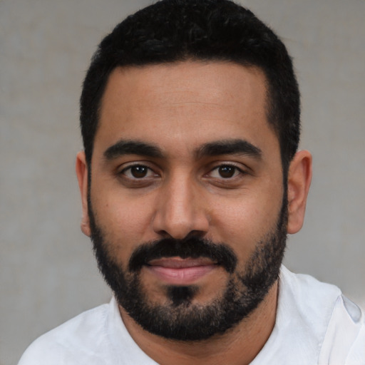 Neutral latino young-adult male with short  black hair and brown eyes