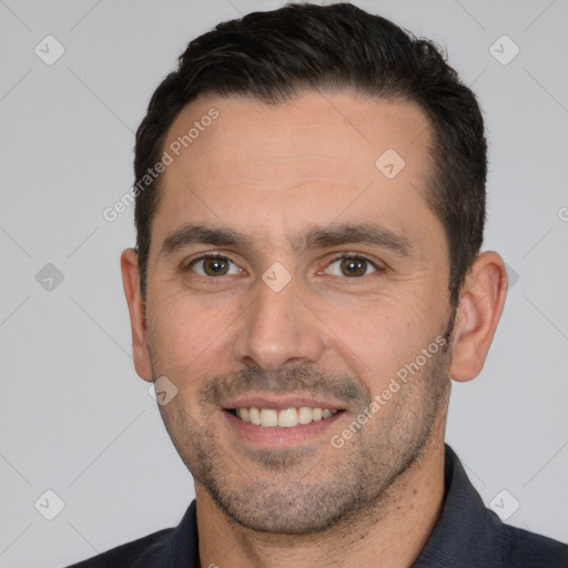 Joyful white young-adult male with short  brown hair and brown eyes