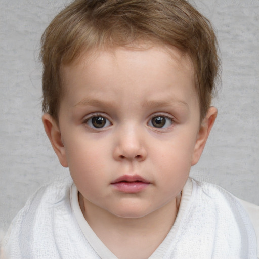 Neutral white child male with short  brown hair and blue eyes