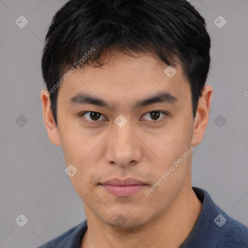 Neutral asian young-adult male with short  black hair and brown eyes