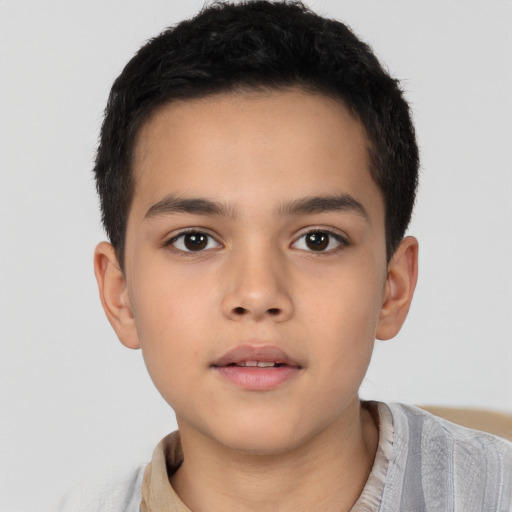 Neutral latino child male with short  brown hair and brown eyes