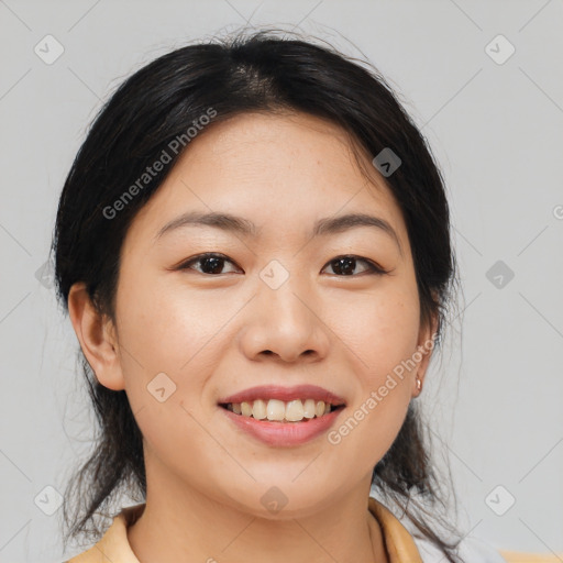 Joyful asian young-adult female with medium  brown hair and brown eyes