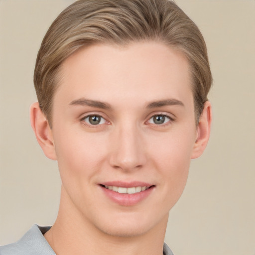 Joyful white young-adult female with short  brown hair and grey eyes