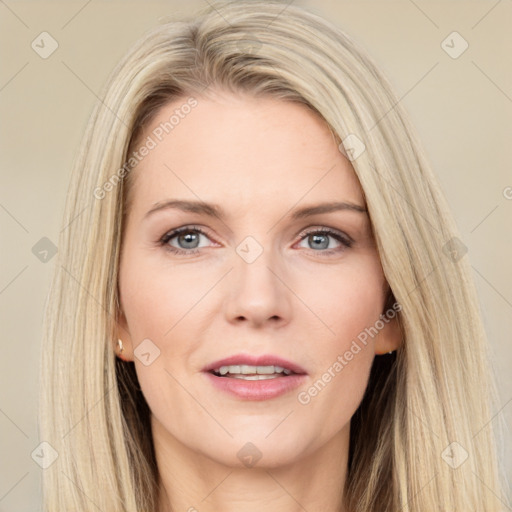 Joyful white adult female with long  brown hair and grey eyes