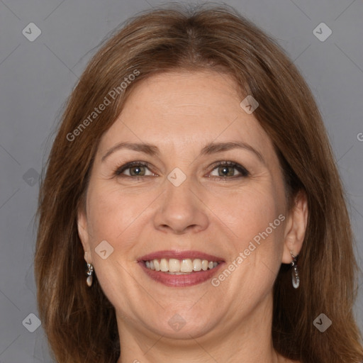 Joyful white adult female with medium  brown hair and brown eyes