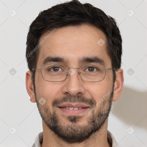 Joyful white young-adult male with short  black hair and brown eyes