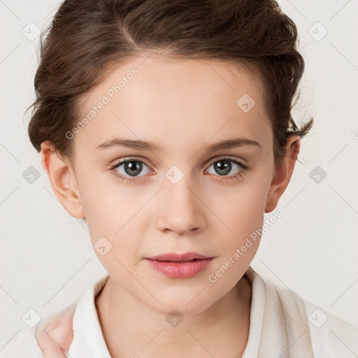 Joyful white child female with short  brown hair and brown eyes