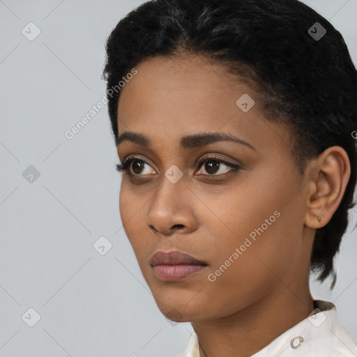 Neutral black young-adult female with short  black hair and brown eyes