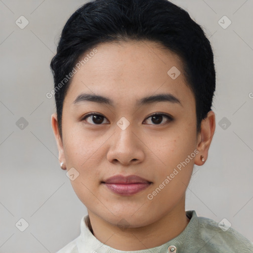 Joyful asian young-adult female with short  black hair and brown eyes