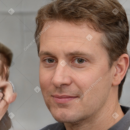 Neutral white adult male with short  brown hair and brown eyes