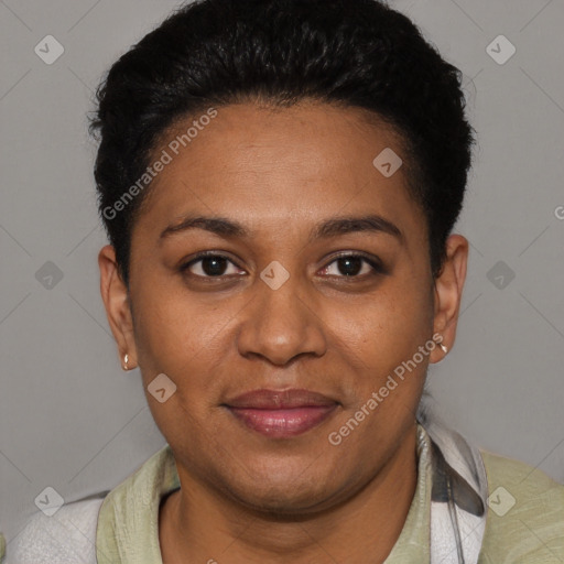 Joyful black young-adult female with short  black hair and brown eyes