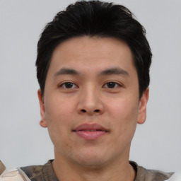 Neutral asian young-adult male with short  black hair and brown eyes