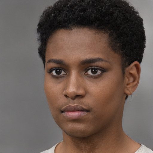 Neutral black young-adult female with short  black hair and brown eyes