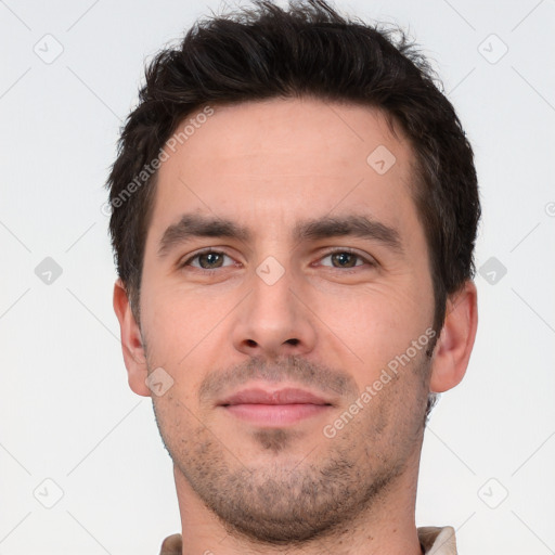 Neutral white young-adult male with short  brown hair and brown eyes