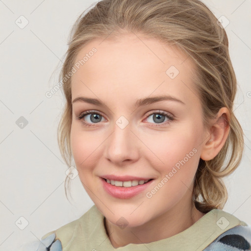 Joyful white young-adult female with medium  brown hair and blue eyes